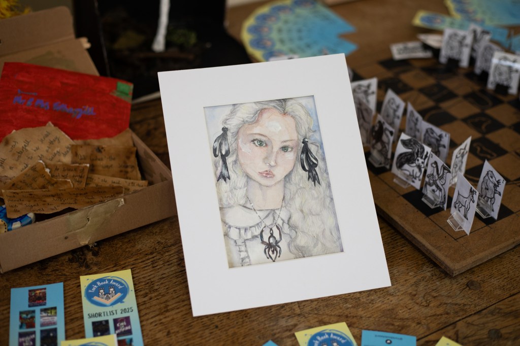 I recognised Etta as soon as I saw this portrait, I love the shine of her ribbons and her spider necklace! 