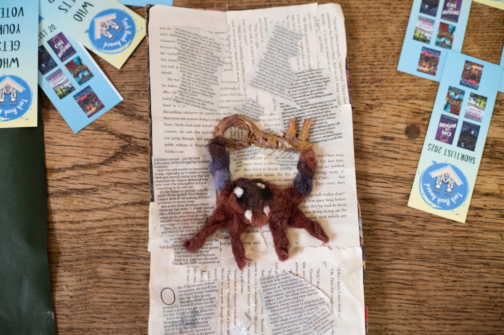 I love mixed media work, and I have a lot of collage in my sketchbook, this is brilliant! The spider is so cute with the little fangs and the point of light in the eyes, and the key! So detailed! 